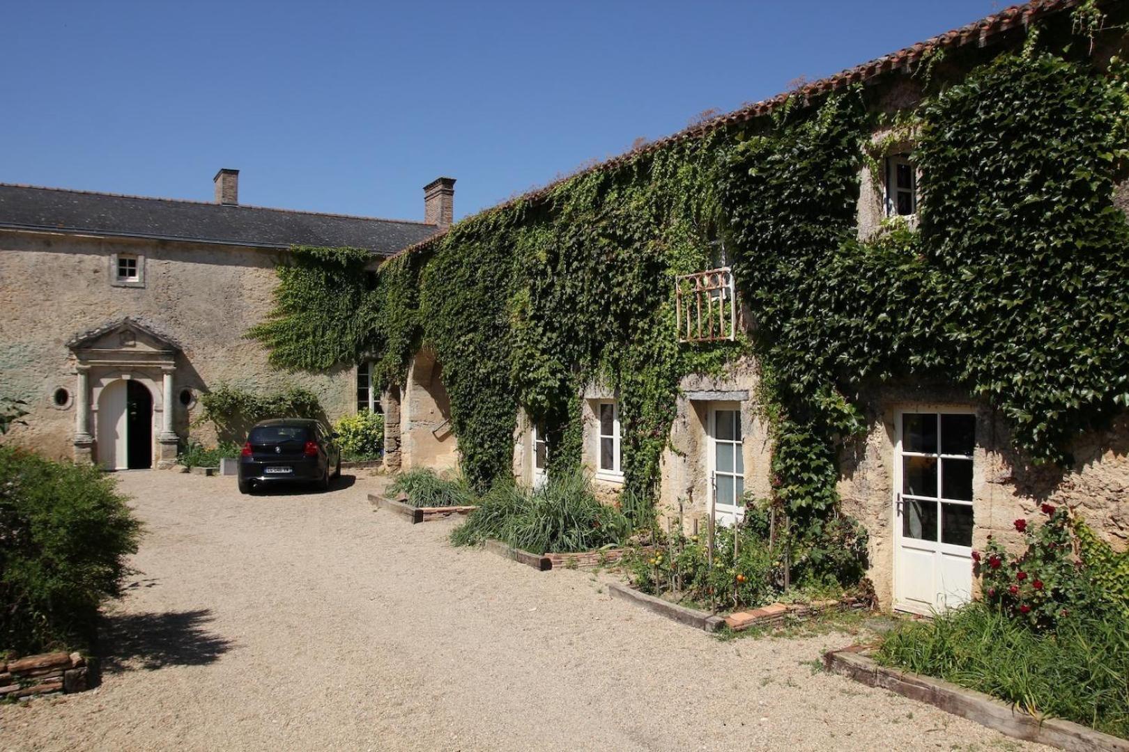 Bed and Breakfast Le Manoir De Gatines Tigné Zewnętrze zdjęcie